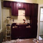 Kitchen remodeled Removed old cabinets, floor and appliances.
Tiled kitchen floor.
Installed new cabinets, appliances, counter top, electrical and pl