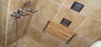 Disability Access Bath Remodel We completely remodeled this residential bath to make it ADA compliant. Notable features include a tiled ramp for ease 