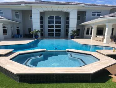 Photos by Oasis Pools and Pavers #1