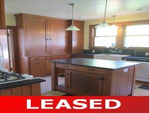 Single Family Home in Seattle Tucked back (From Holman Road, turn Right onto 12th and then Right on to the 9500 Block) is a spacious, charming rambler