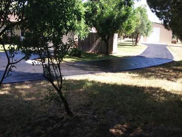 Apshalt Driveway Sealcoat This asphalt was allowed to cure for 1 year prior to sealcoating.