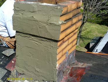 This is a panoramic display of a variety of photos from numerous jobs. We are showing everything from a flat membrane roof to box gutter and chimney re