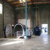 Swift Engineering Modification of an existing building for the installation of two industrial autoclave systems. A concrete pit and exterior covered eq
