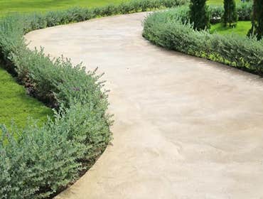Photos by Stamped Concrete Denver LLC #1 Stamped concrete, often called textured or imprinted concrete, replicates the look of many different stones su