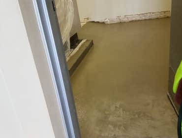 Freeman Coliseum Contracted to demo existing concrete and pour new ADA compliant entrance with ramp.