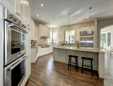 GULICK | CUSTOM Home in McLean The impressive stone and HardiePlank® elevation on our Winthrop really stood out on this corner lot of approximately one