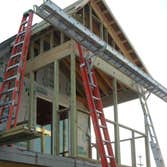 Custom Design Homes Project 1 Custom Design Homes added a screen porch overbuild. There was an open deck prior to this beautiful addition.