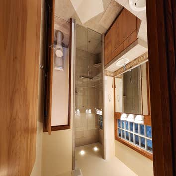 Photos by Burkhardt Construction LLC #1 My Clients shower pan failed, causing the main support beams for the curb less shower to Rot. I had to demo the