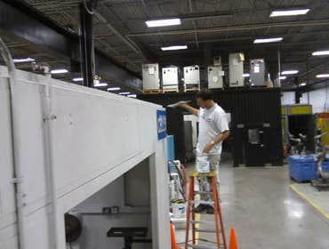 Painting a machine Machinery Painters