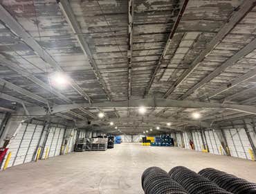 Photos by White Light Electric Inc #1 Replace all existing high bay fixtures with new LED high bays