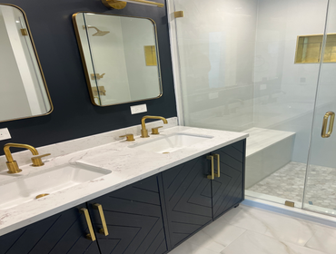 Photos by Goat Construction Group LLC - Bronzeville Bathroom Gut rehab with premium finishes.