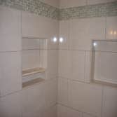 Staunton House Bathroom Complete gut and remove all existing plumbing to install a jacuzzi tub and walk in shower. This project came out beautiful. W