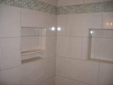 Staunton House Bathroom Complete gut and remove all existing plumbing to install a jacuzzi tub and walk in shower. This project came out beautiful. W