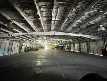 Photos by White Light Electric Inc #1 Replace all existing high bay fixtures with new LED high bays