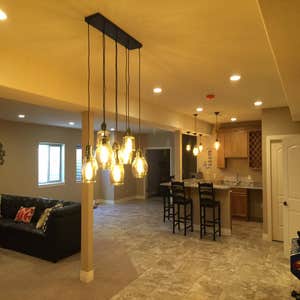 West Arvada basement Full basement finish. This basement has 2 bedrooms, a full bath, wet bar and very nice open concept.