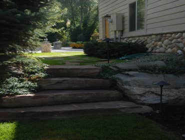 Larkin Landscaping Our landscape services entail total Installation of sprinkler systems, concrete work, water features, fire-pits, retaining walls, pa