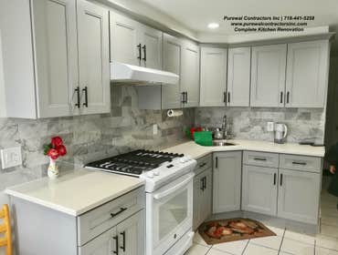 Canarsie Kitchen Renovation The clients have a big family, so the space needed to be reconfigured to accommodate that.Alongside the new floors, in-set 