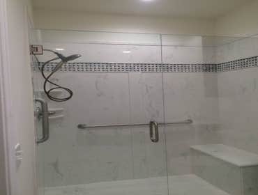 Photos by North Alabama Remodeling Co. LLC #2 Cultured marble showers with tile feature inlays in custom designed bathroom remodels