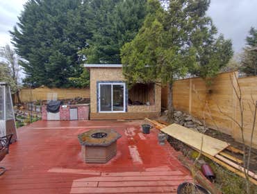 Photos by Stewart & Son Gate & Fence LLC #1 Tiny House with pergola. Small house 17' by 12' small bathroom with pocket door, and small sink with water 