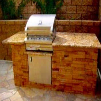 various projects Elegant outdoor dining with this three rivers flagstone semi-circle bench. Constructed of concrete block and 3’ natural gas fire pit f