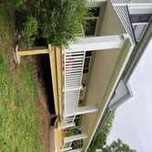 Photos by Jbr Superior Home Improvement Inc Full front porch top to bottom