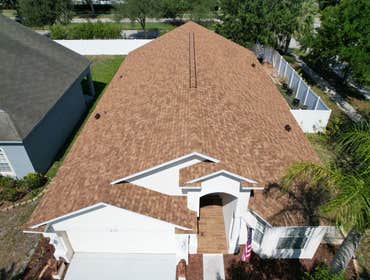 Photos by WOODSTONE ROOFING