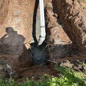 220 feet of Storm Sewer Install 200 feet of storm sewer connecting to 5 down spouts
