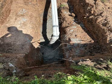 220 feet of Storm Sewer Install 200 feet of storm sewer connecting to 5 down spouts