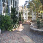 Tech-Noir Landscapes, Inc. Photos This display shows an array of fire pits, water features, and barbeques that add that special touch. Hard scape photo