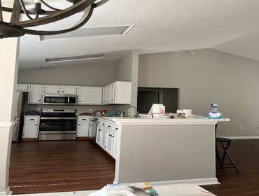 Photos by Tropical Building & Remodeling Inc #1 Completely removed old kitchen and end pony wall. Cut down pony wall to cabinet height and installed ro