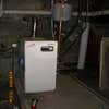 Tom Reigel Heating and Plumbing Services logo