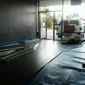 Tanning Salon Commercial Remodel Construction Electric Beach Tanning Full Gut Remodel, Framing, Electrical, Drywall, Paint, Flooring and Baseboard