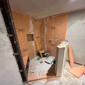Photos by American Remodels Inc #5 Condo bathroom remodel. We changed the layout of the bathroom. We plumbed the shower and sink. Drains and water...