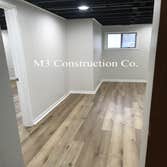 Photos by M3 Construction Co #3 Tear out drop cieling. Spray cieling black, frame in new wall with close and bedroom door. Paint walls, new door and cl