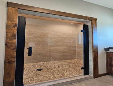Photos by Wethered Timberworks LLC Dba Wethered Construction #1 Custom Home