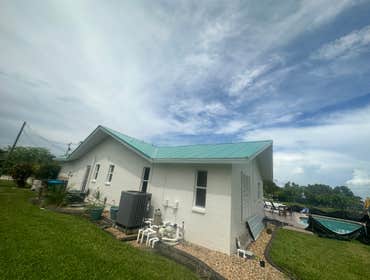 Photos by Carmody Construction Fl Inc #4 Custom Metal roof project in Cape Coral