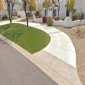 Concrete driveway with exposed aggregate bands - Scottsdale, AZ