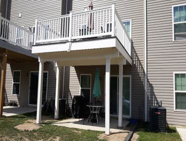 Photos by Saviors Custom Carpentry, Inc #1 Composite steps, vinyl railings & 1x4 azek