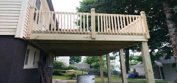 Photos by Canady Construction & Home Improvement #1 10x20 Deck with sliding glass door addition