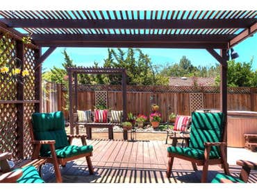 Opening up family room to "add" the outside to inside - creating a dramatic dining deck and spa area w access from family and master bedrooms