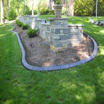 Hanover area we installed curbing around a retaining wall