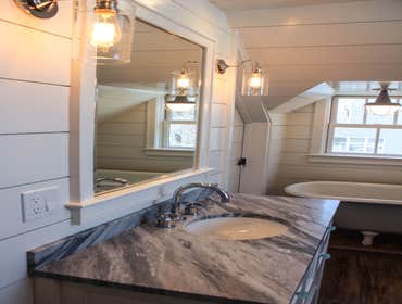 Baine Contracting Inc Project Multiple jobsites - showing kitchens, interior and exterior trim work, new homes, bathrooms, tile work, wood and iron ra
