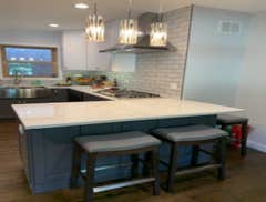 Photos by Es Carpentry Inc #1 Basement and first Floor complete gut and Remodel