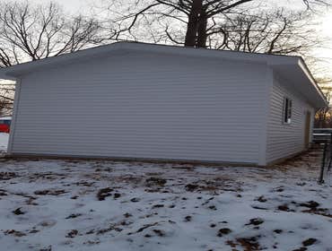KVK LLC - Garage PortBo Add a new garage, outbuilding, accessory structure. 12'x24' including new concrete slab.