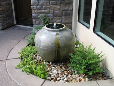 Tech-Noir Landscapes, Inc. Photos This display shows an array of fire pits, water features, and barbeques that add that special touch. Hard scape photo