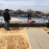 Photos by Creative Builders inc Removed Old Roof and Plywood ,installed new SBS180 Rubber Roof with insulation,installed New skylights and Installed ne