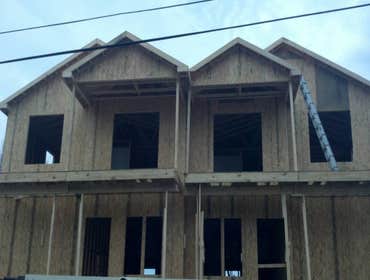 Photos by Teagan Homes #1 New construction of two townhomes sold to individuals for about $450000 each unit. Profit margin was over $250,000 in less th