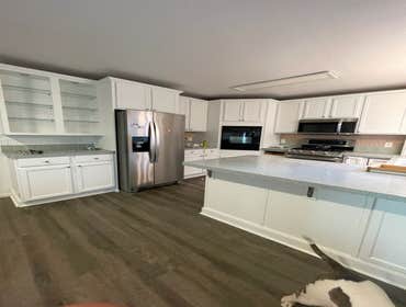 Photos by Professional Painting #1 Cabinet paint, complete prep work, primed, and 2 coats of Sherwin Williams Gallery series paint in dove white