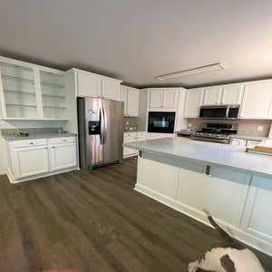 Photos by Professional Painting #1 Cabinet paint, complete prep work, primed, and 2 coats of Sherwin Williams Gallery series paint in dove white