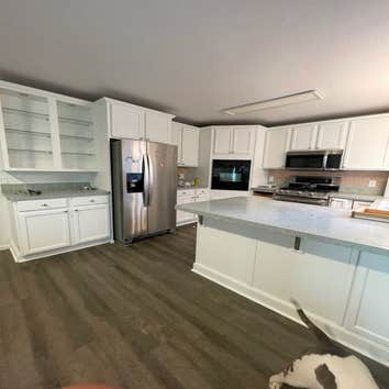 Photos by Professional Painting #1 Cabinet paint, complete prep work, primed, and 2 coats of Sherwin Williams Gallery series paint in dove white